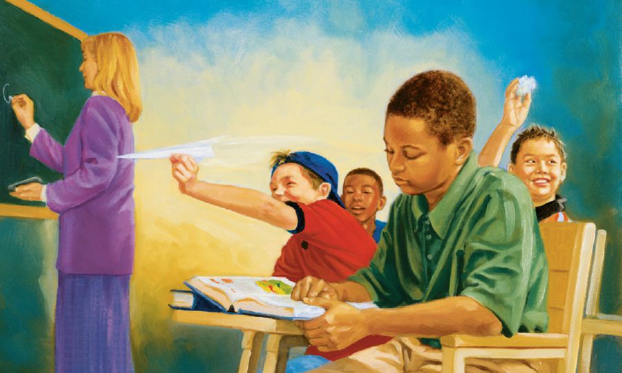 Een jongen is op school aan het leren, terwijl zijn klasgenoten zich misdragen