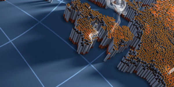Hundreds of cigarettes arranged in the shape of countries on a world map