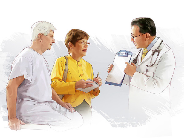 Enquanto um médico conversa com o casal, a esposa faz anotações