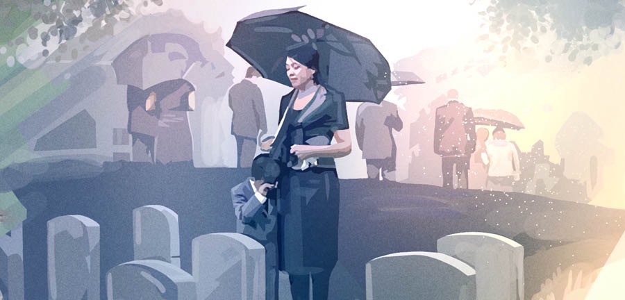 Persoane îndurerate într-un cimitir