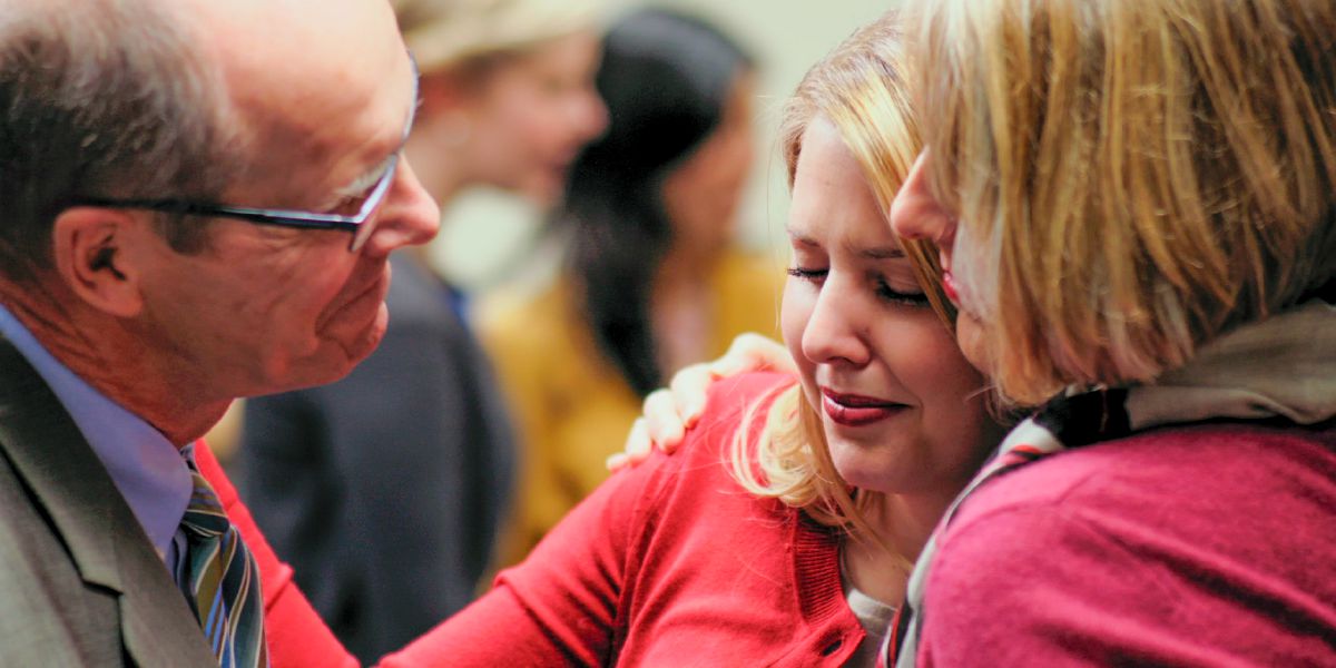 Sonja’s parents embrace her