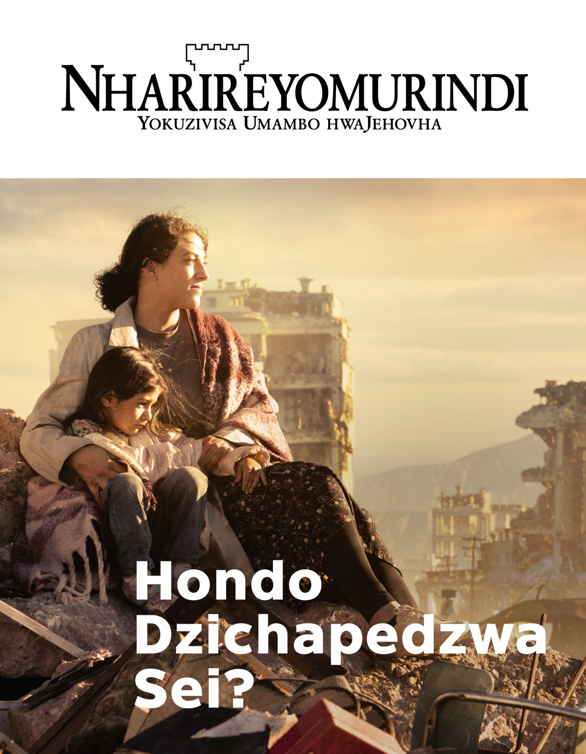 Mukadzi akambundira mwanasikana wake vakagara pazvivakwa zvaparadzwa nehondo muguta. Nechepedyo navo pane zvimwe zvivakwa zvaparadzwawo.