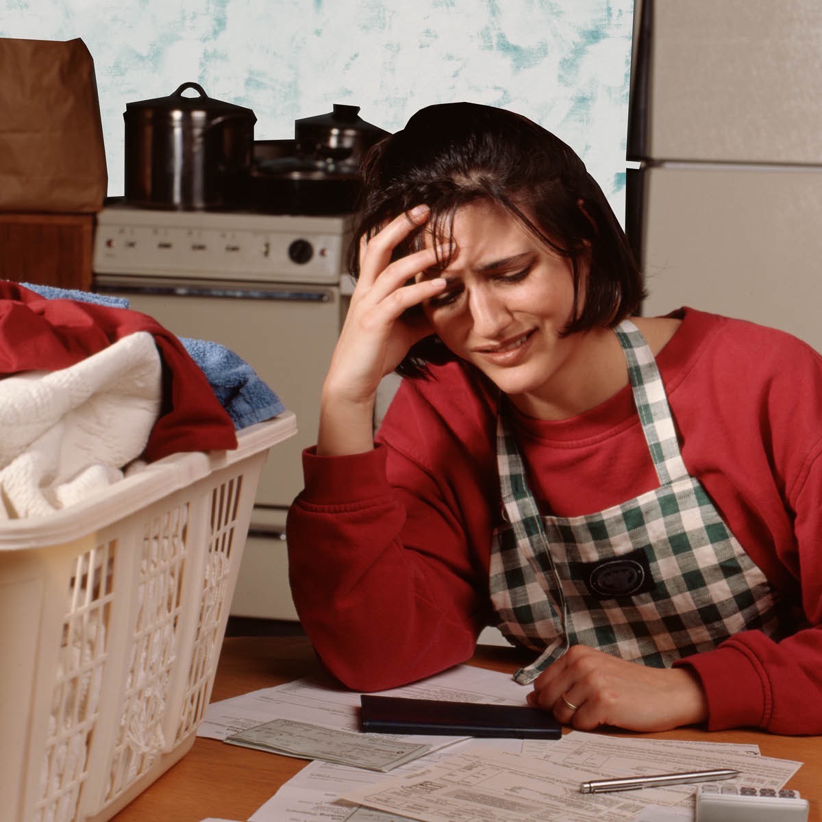 Një grua stresohet për shkak të parave