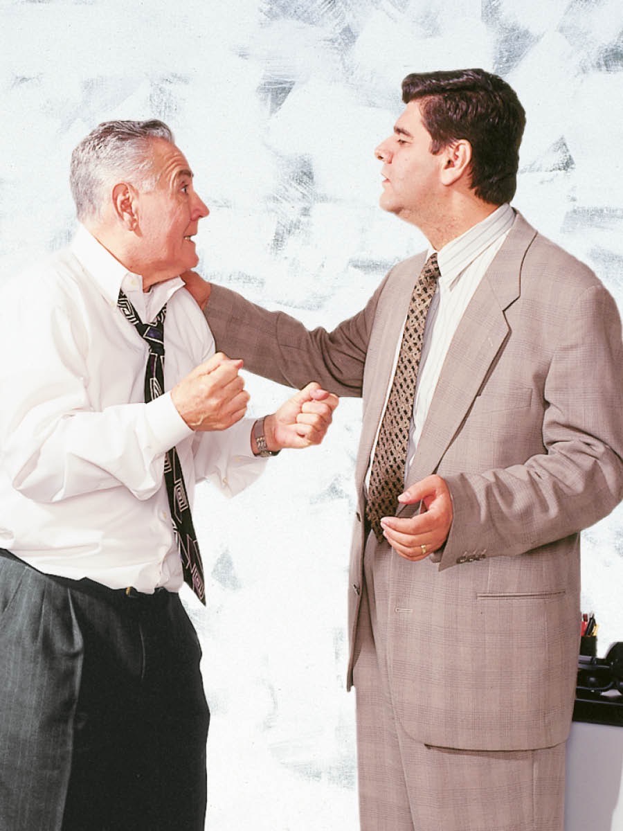 A man deals calmly with an angry man