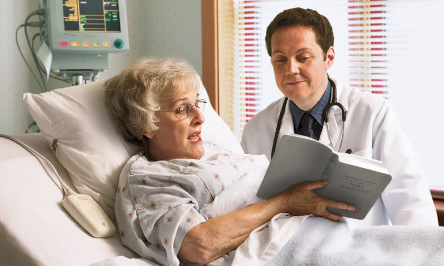 A Christian in a hospital explaining to her doctor what the Bible says about blood