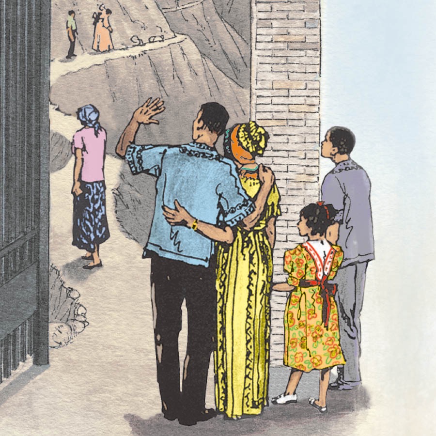 Ìdílé kan dúró sí ibi ẹnu ọ̀nà tóóró, wọ́n sì ń wo àwọn tó wà ní ọ̀nà híhá náà