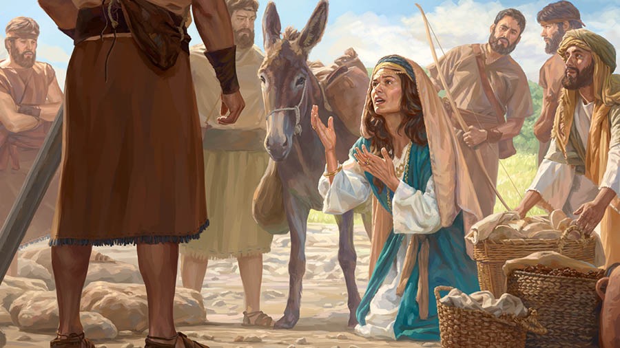 Ábígẹ́lì kúnlẹ̀ bó ṣe ń bá Dáfídì sọ̀rọ̀.