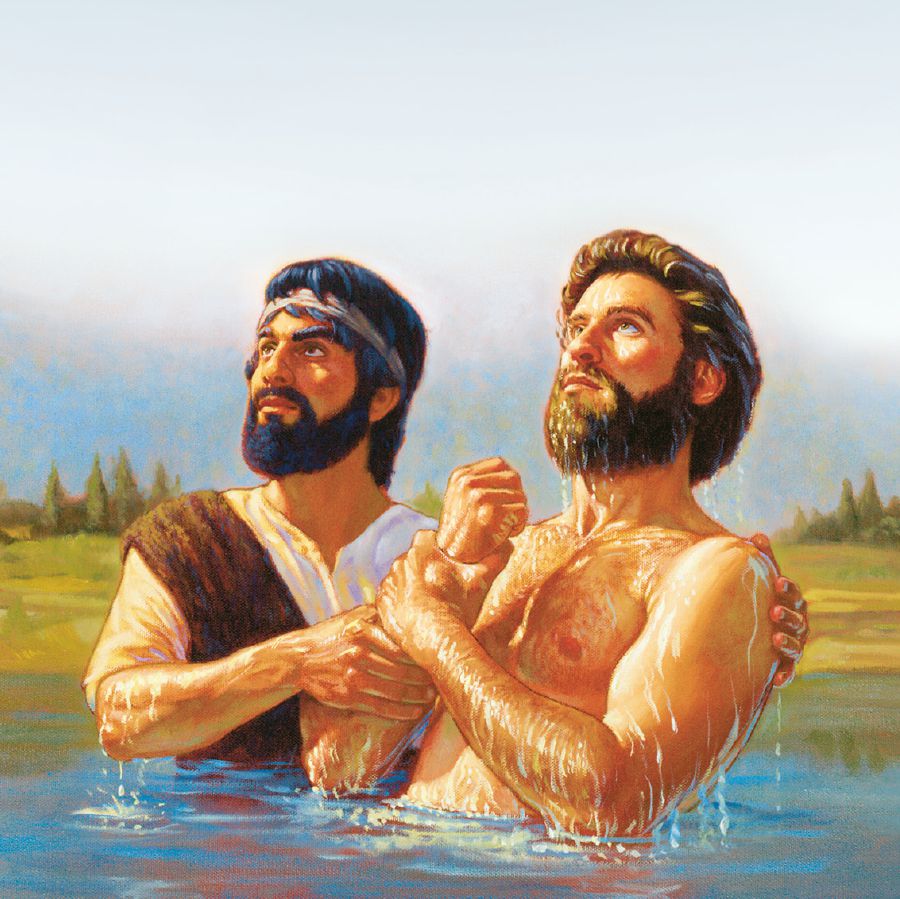 Jesús sale del agua después de que Juan el Bautista lo bautiza